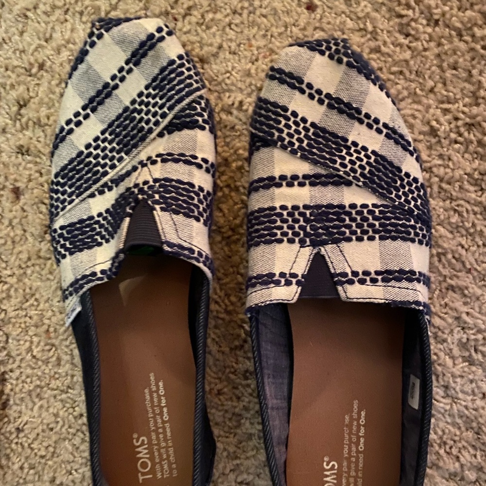 Toms. Never worn